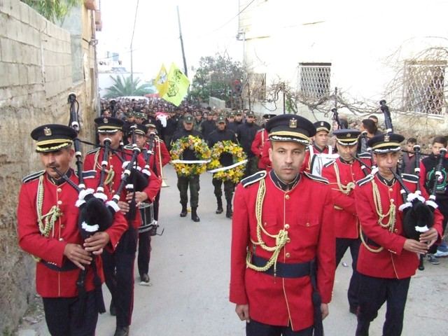 قوات الأمن الوطني الفلسطيني تشيع جثمان الشهيد الأسير المحرر العميد أيمن جرادات بمشاركة جماهيرية